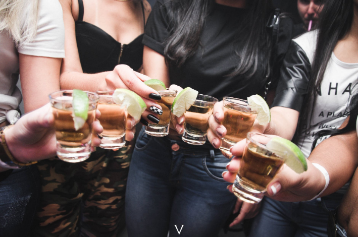 a group of people enjoying their drinks